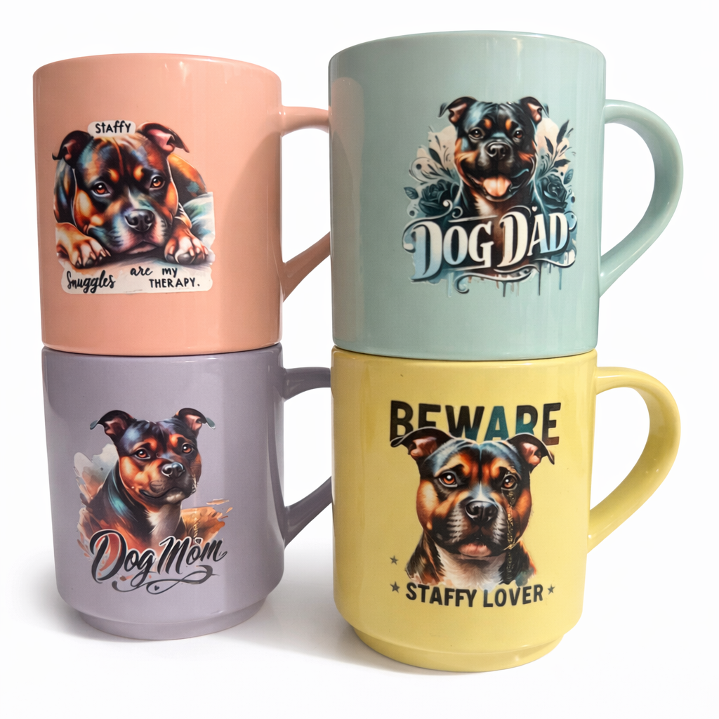 Four mugs with Staffordshire Bull Terrier illustrations and text on a white background