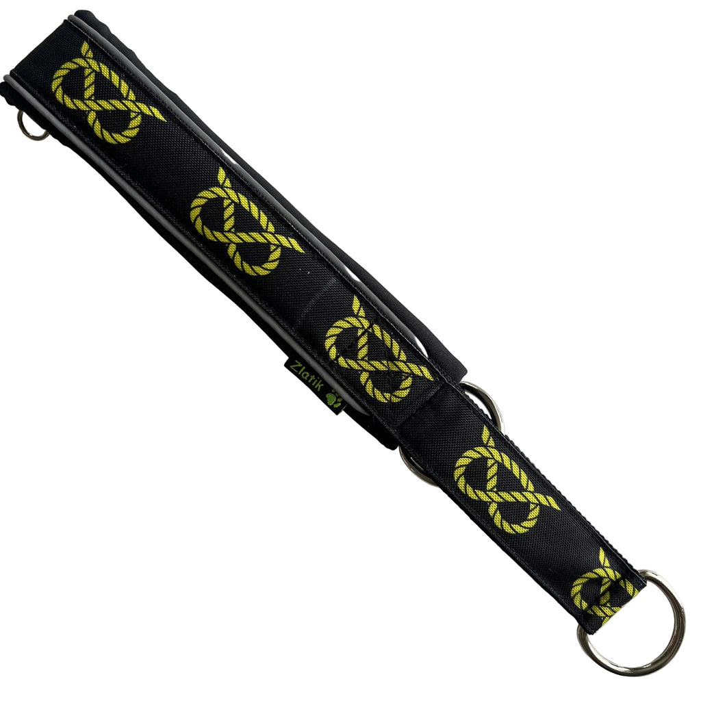 Black soft martingale collar with yellow stafford knot pattern on a white background