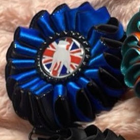 Blue ribbon with a Union Jack design on a union jack textured background