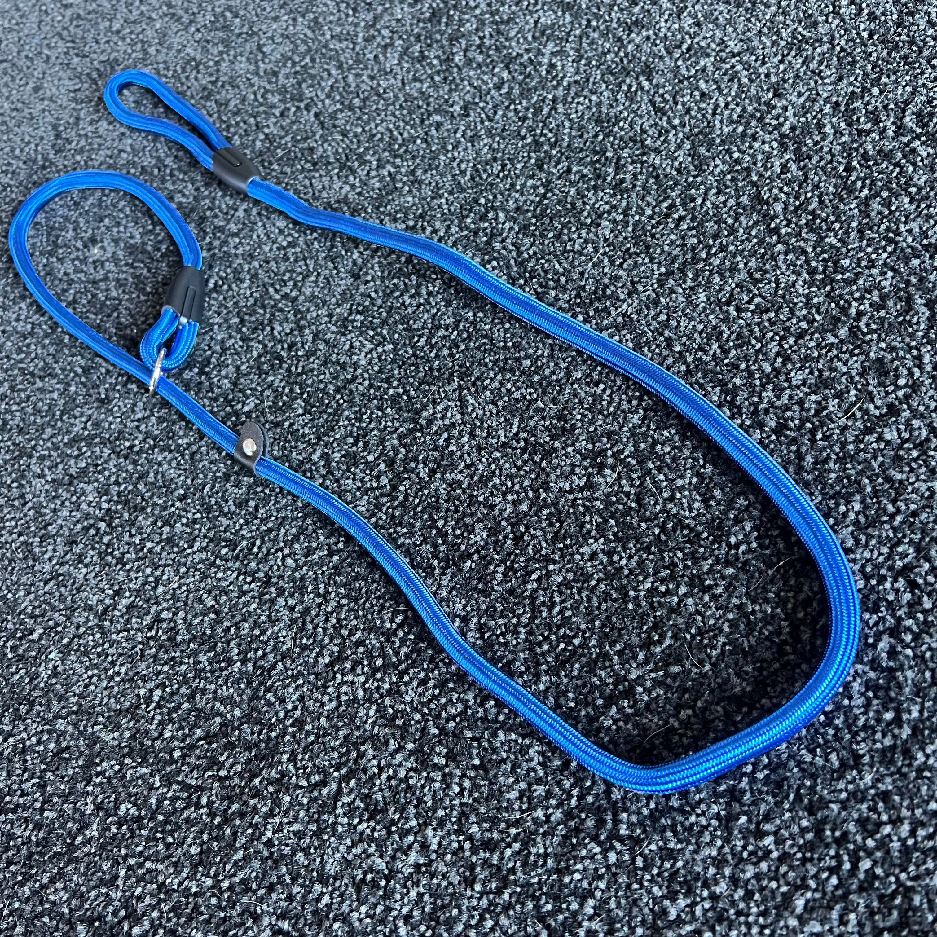Blue Slip Leash on a textured black surface