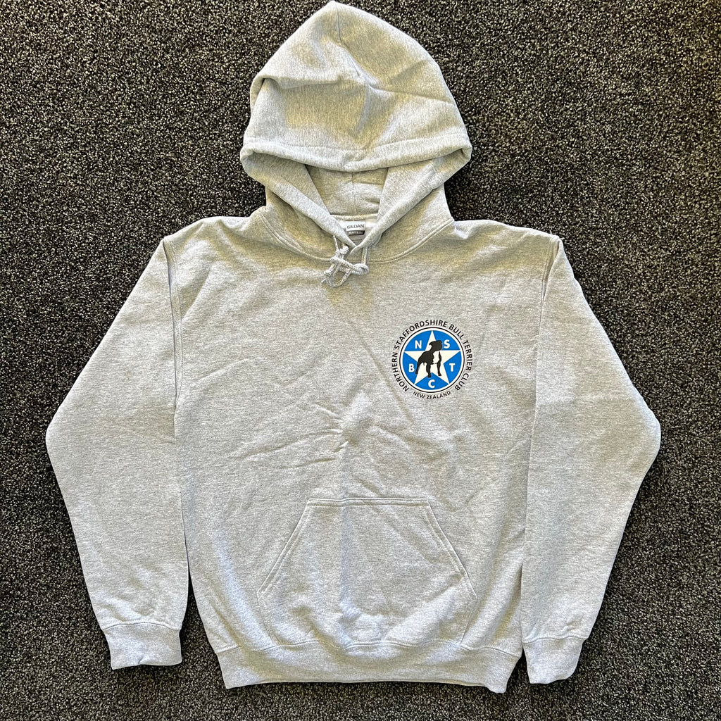Gray hoodie with a logo on a dark textured surface