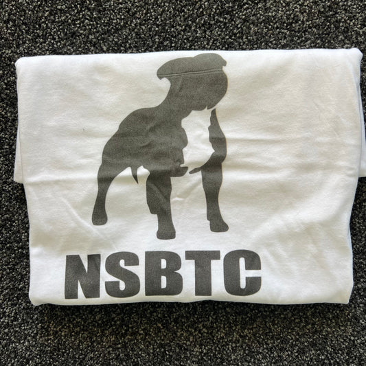 White t-shirt with black graphic and 'NSBTC' text on a textured surface