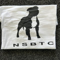 White t-shirt with black silhouette and 'NSBTC' text on a textured surface