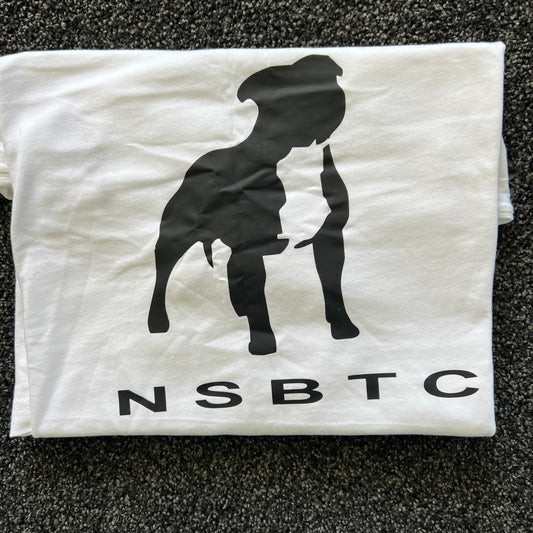 White t-shirt with black silhouette and 'NSBTC' text on a textured surface